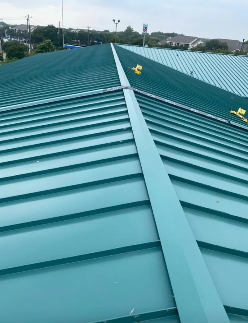 Green commercial metal roof ridge and valley for Metal Roof Repair in Okeechobee